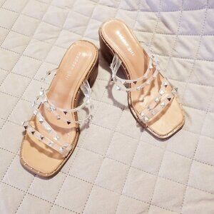 Madden Girl Women’s Roam Studded Block Heel City Sandal.